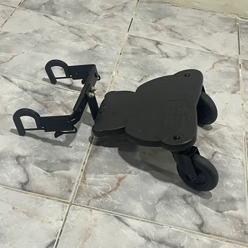 Carrinho auxiliar para carrinho de bebê