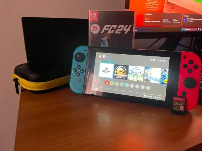 Nintendo Switch V2 Completo + 2 Jogos (Zelda e EA FC 24) + Case + 5 Anos de Garantia (Troc