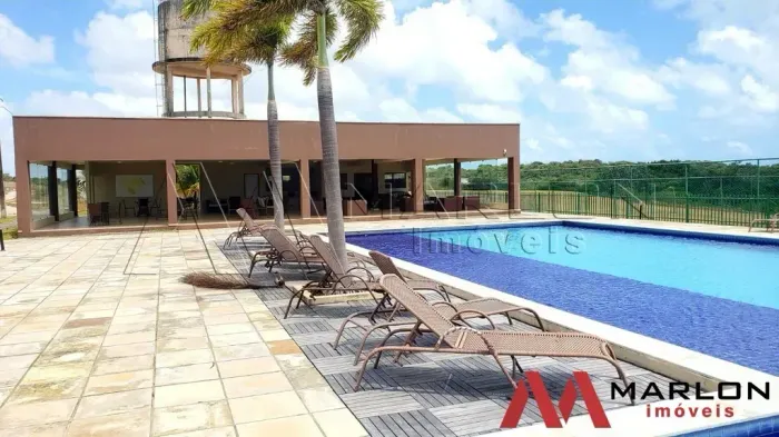 Terreno em Condomínio Palm Springs, plano, 367m², área de lazer completa.