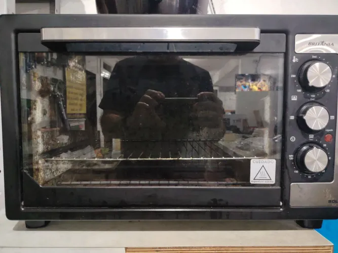 Forno elétrico Britânia 50 litros funciona tudo