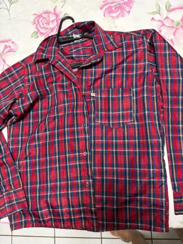 Um camisão xadrez estilo Junino que veste até 15 anos
