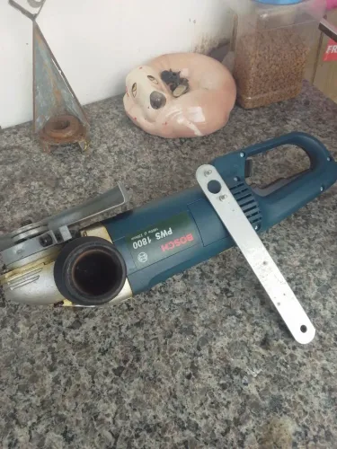 Vendo lixadeira de 9" Bosch semi nova