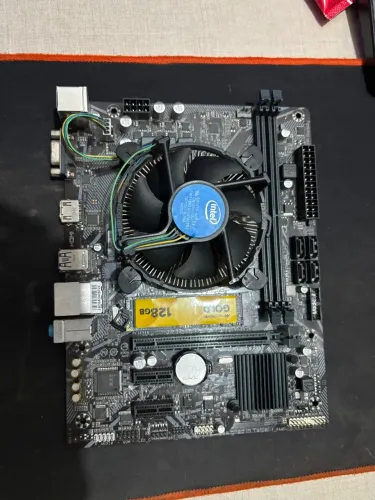 I3 10100 (com vídeo integrado), placa mãe GIGABYTE H410, SSD NVME 128GB MACROVIP