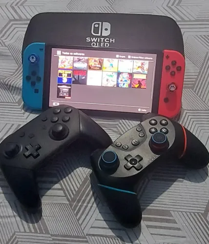 Nintendo Switch Oled 64gb+2 controles SWM CARREGADOR