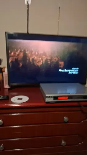 DVD Britânia + mais ou menos 50 filmes.