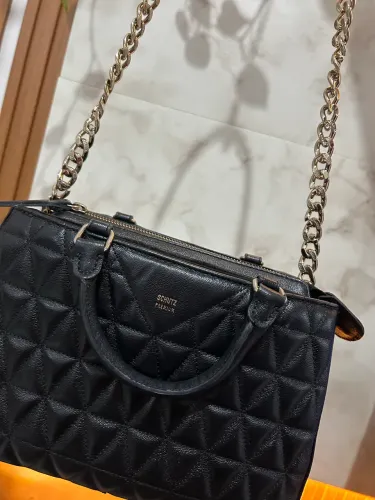 Bolsa matelassê Schutz