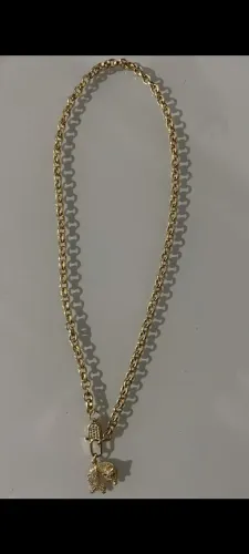 Vendo 2 pares de brincos 1 pulseira e um cordão todos são folheados e uma bolsinha