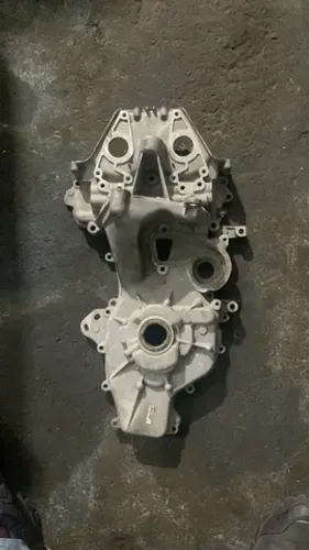 tampa lateral motor + bomba de óleo logan 1.0 12V