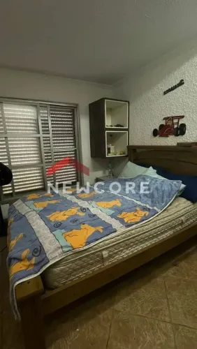 Casa em Rua dos Miosótis - Flórida - Praia Grande/SP