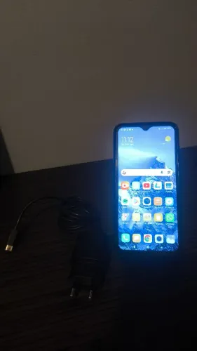Celular Xiaomi Mi 9 com carregador 