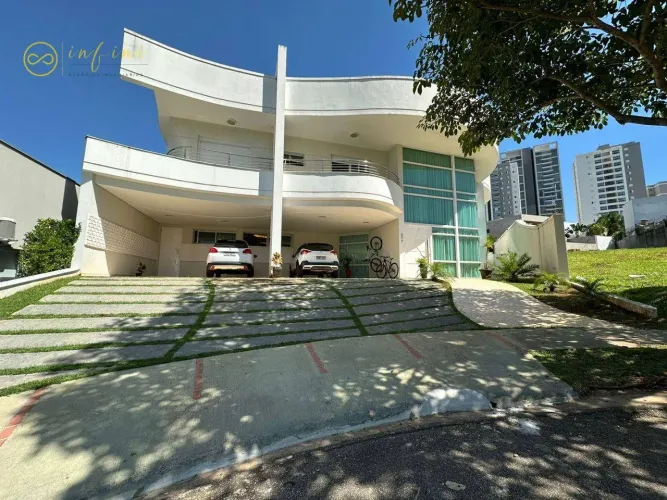 Casa com 4 suítes, sendo 1 máster 586 m² - á venda por R$ 3.800.000 - Condomínio Residenci