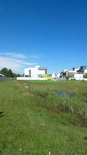 Terreno plano de 396,90m², plano, com ESCRITURA PÚBLICA, no Condomínio Caminho do Engenho