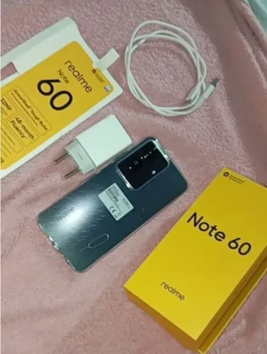 celular novo, comprado tá 5 dias,Reame 60,com nota fiscal na caixa