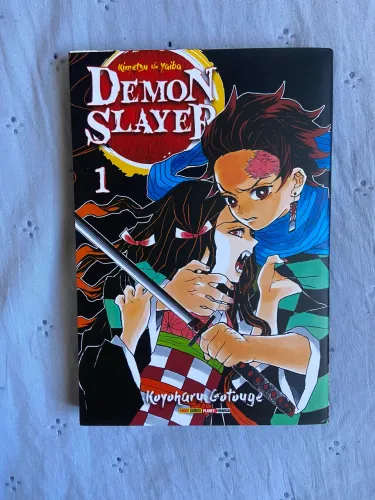 mangá volume 1 de Demon Slayer: Kimetsu no Yaiba
