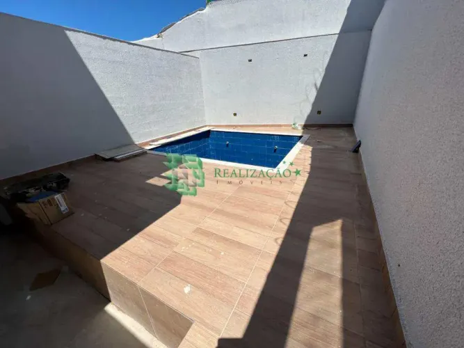 sobrado na  praia grande com piscina, 3 dormitórios a 50 metros da praia