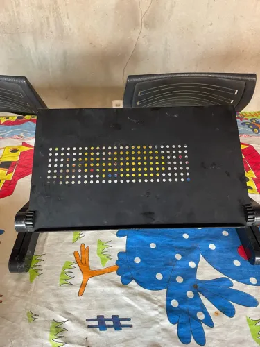 Vendo mesa articulada para notebook ?