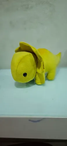 Pelúcia Dinossauro Triceratops verde