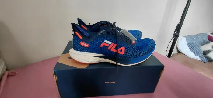 Tenis de corrida