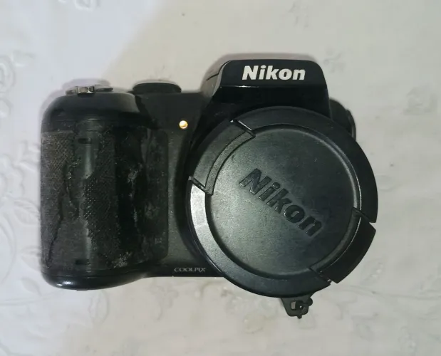 Vende-se câmera Nikon 16 megapixels e 21 X de som!!