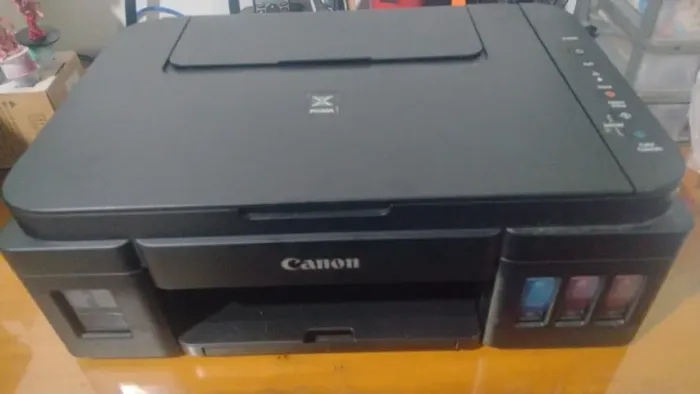 Impressora Cannon jet recarregável usada mas funcionando perfeitamente
