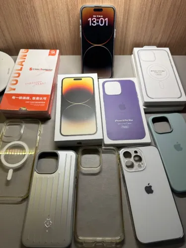 iPhone 14 Pro Max Dourado - Única Dona + Lote Completo de Capas e Películas Originais