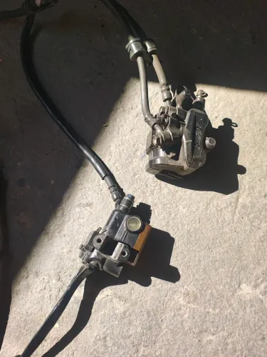 Pinça freio combinado Titan Fan 160 até 24.