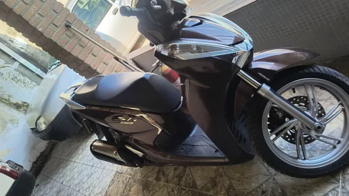 Moto pouco usada de garagem aceito troca por Honda nisso nova