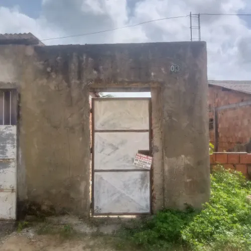 Terreno com Casa Inacabada