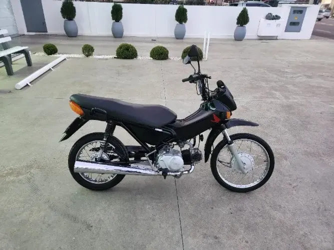 Pop 100 baixa km e muito bem conservada