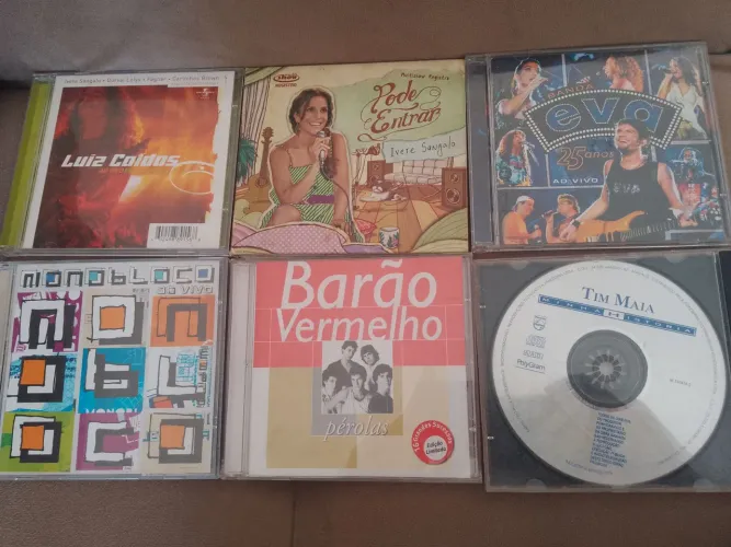 Cds de axé, rock e Tim maia