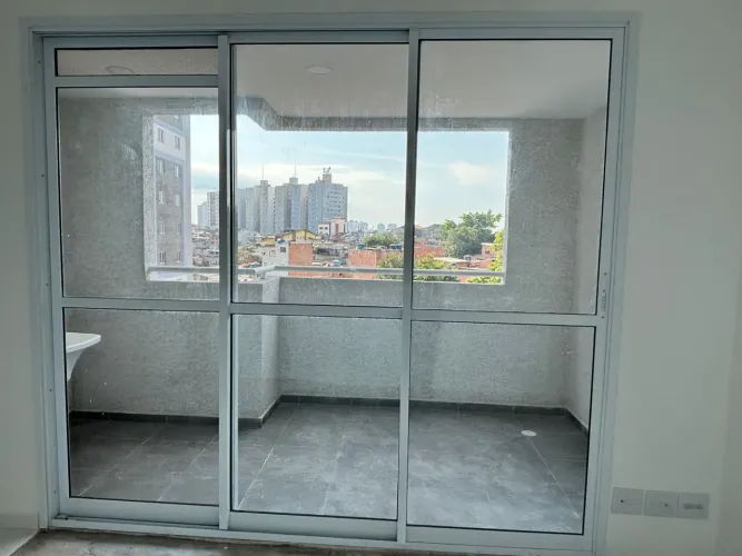 Porta balcão 3folhas, sendo 2 móvel e 1fixa, medida 2,70 X 2,43, alumínio branco, 1,200.00