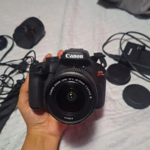 Canon t100 completa com assessórios + lentes 75-300