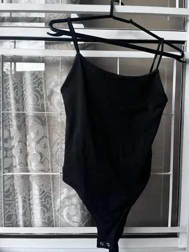 Vendo body preto tamanho p-pp em perfeito estado 
