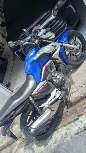Vendo 160 titan tudo ok so transferir tem passagem por leilão nao consta no doc