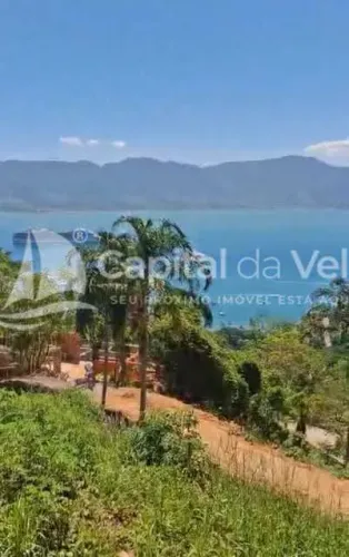 TERRENO COM VISTA PARA O MAR, EM CONDOMÍNIO PRÓXIMO AO YACTH CLUB EM ILHABELA, ESCRITURA D