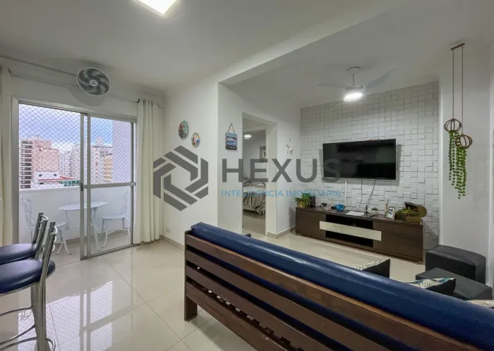 Apartamento com varanda e lazer a 1 quadra da praia nas Pitangueiras, Guarujá