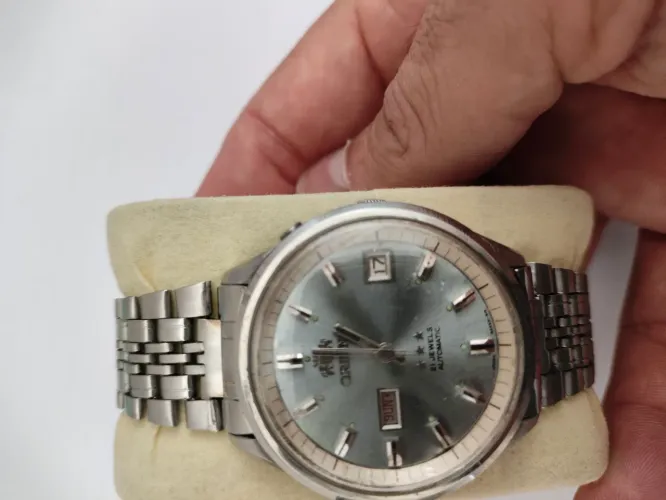 Orient 3 estrelas automatico duas janelas