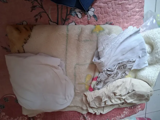 Lenço de elástico para colchão de bebê.