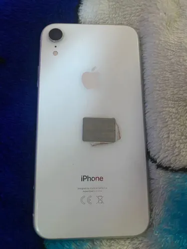 Vendo iPhone XR branco 64Gb em perfeito estado com a bateria trocada.