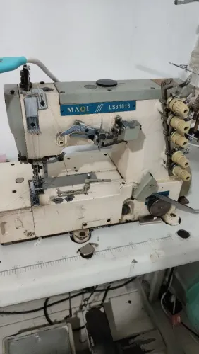 Máquina galoneira