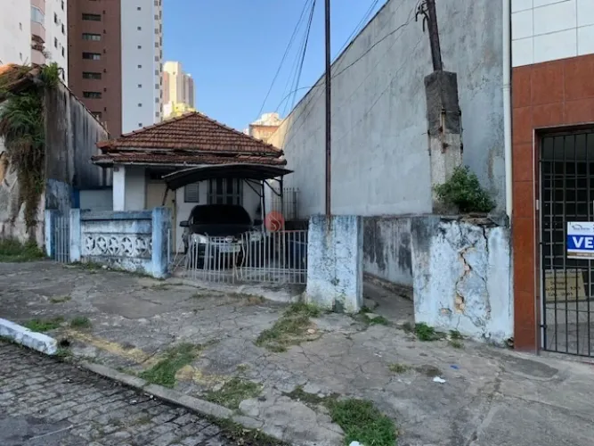 Terreno com duas moradias antigas para venda no Anália Franco.