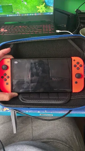 Nintendo switch oled 64 gb novinho com caixa