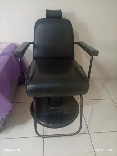 Cadeira de barbeiro usada