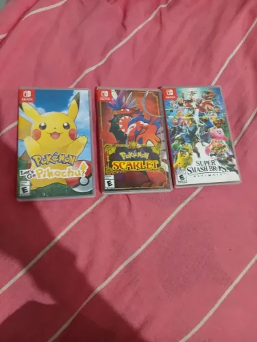 Jogos Nintendo Switch originais-pokemon scarlet e let's go pikachu, super smash bross.