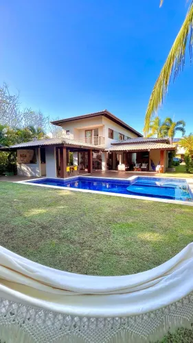 Casa a venda em praia do forte com 4 suites no condominio das acacias no piscinas naturais