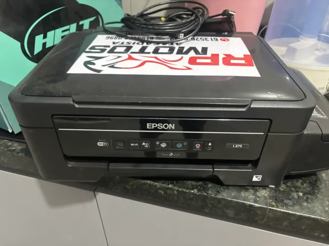 Impressora Epson l375 comprei outra mais atualizada, essa tá toda boa .