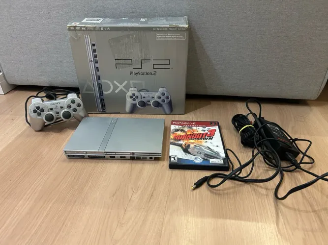 PlayStation 2 Slim Prata com Caixa Bloqueado