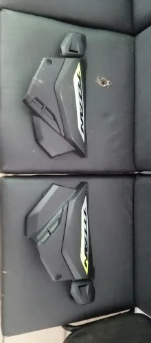 Tampa lateral da Titan 160 