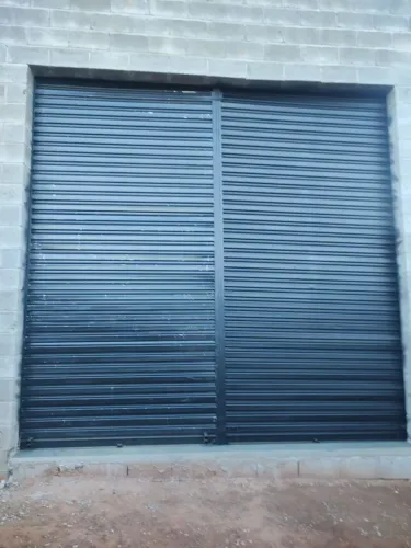 Porta de enrolar manual