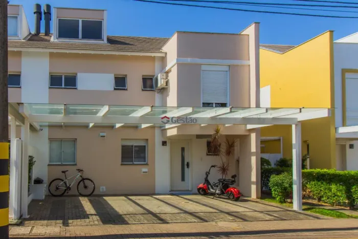 Sobrado no Condomínio Privilege House com 4 Quartos no bairro Moinhos de Vento, em Canoas.